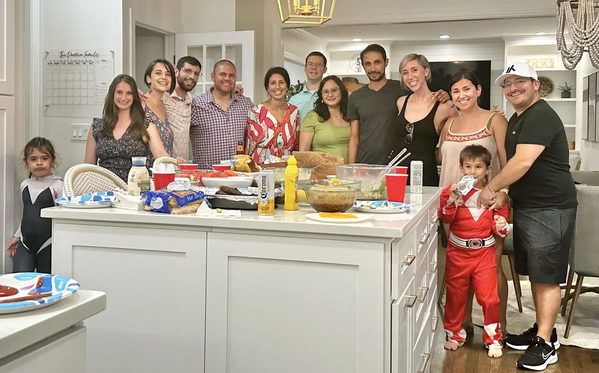 Group gathered around counter for JGather event