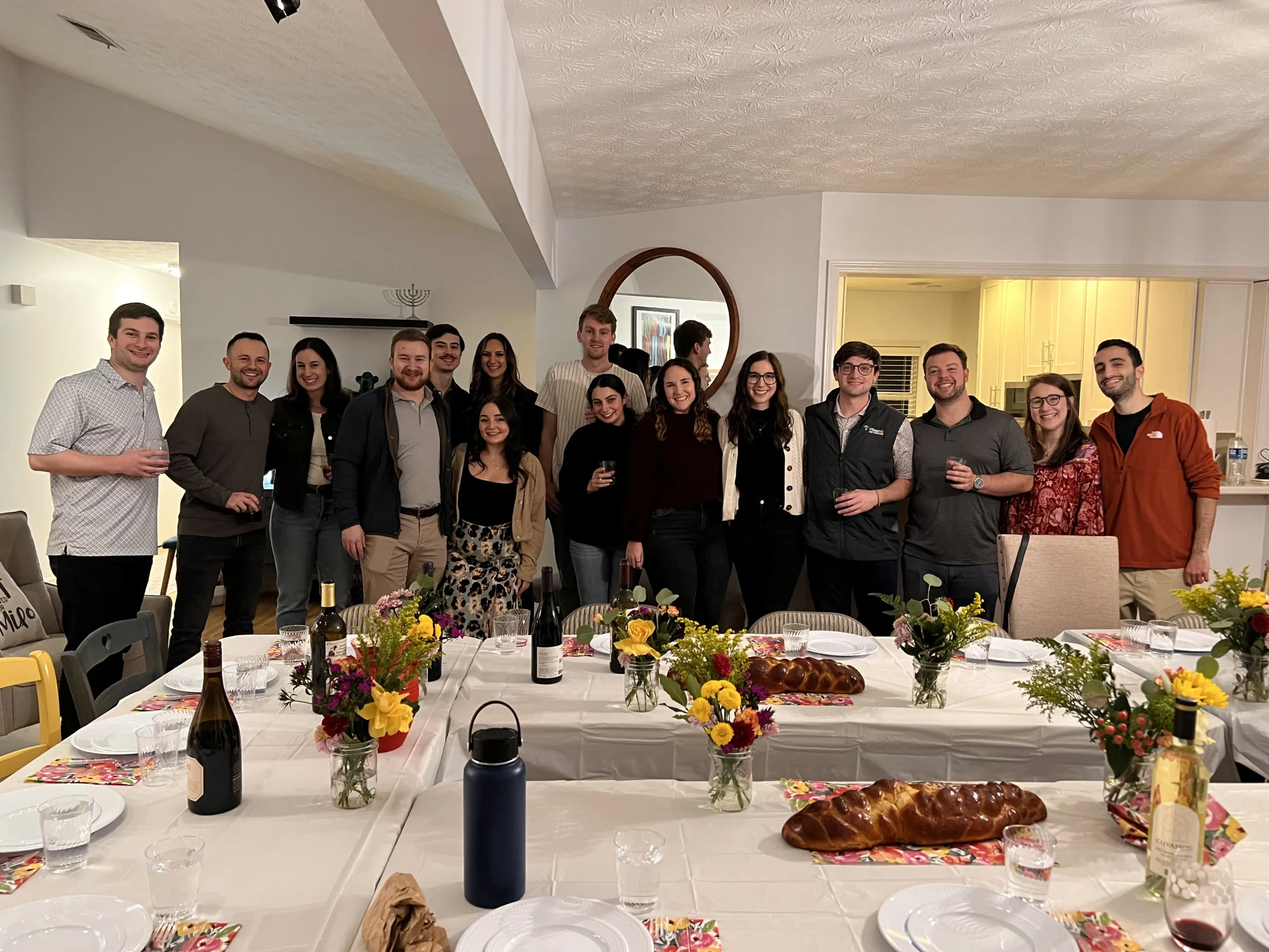 A group of adults gathered for a JGather event