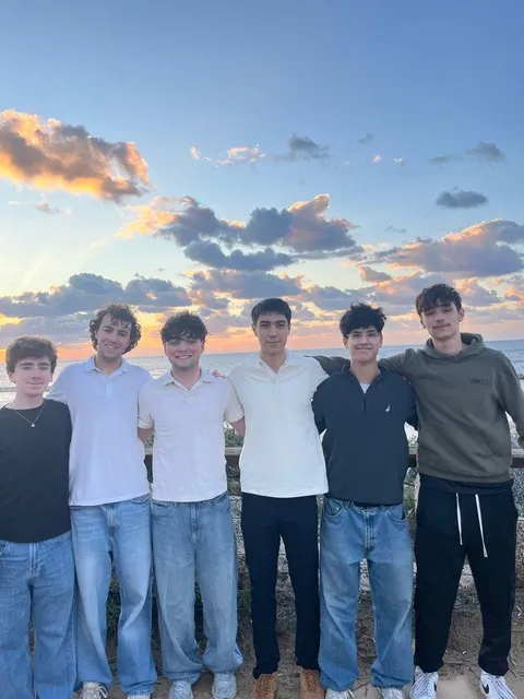 A group of seniors from Atlanta pose for a group photo while visiting Israel