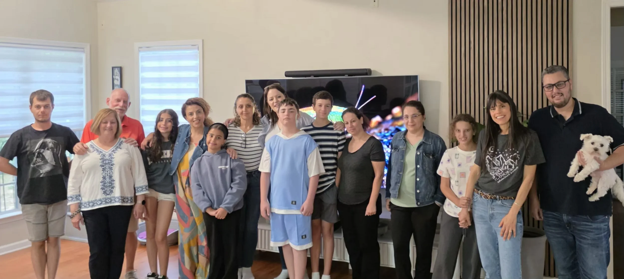 Israeli teens and adults gather together in an Atlanta-area home during a summer visit connected to the Campers2Gether program.