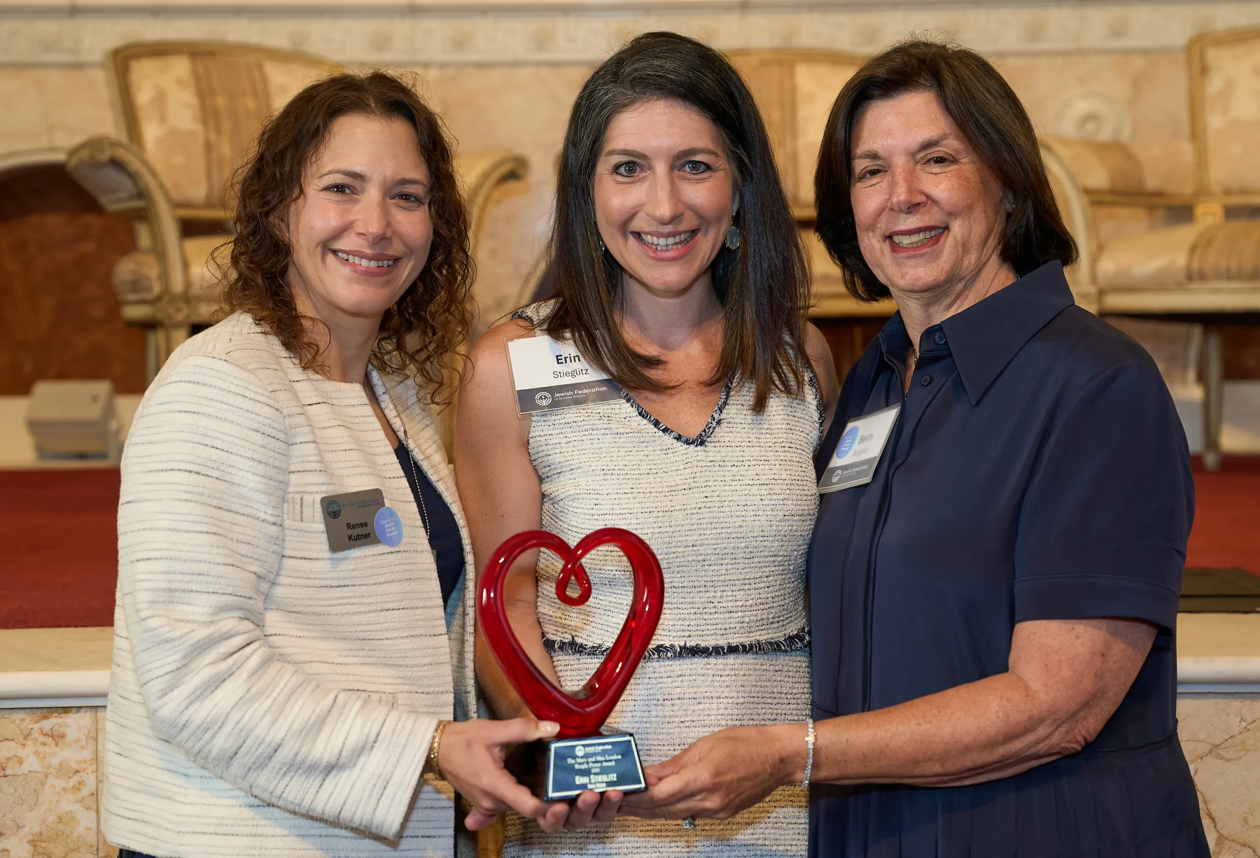 Erin Stieglitz of Bagel Rescue accepting 2025 Annual Award