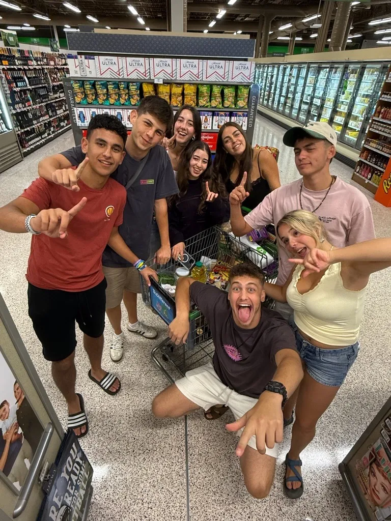 FY26 Shinshinim group photo in grocery store