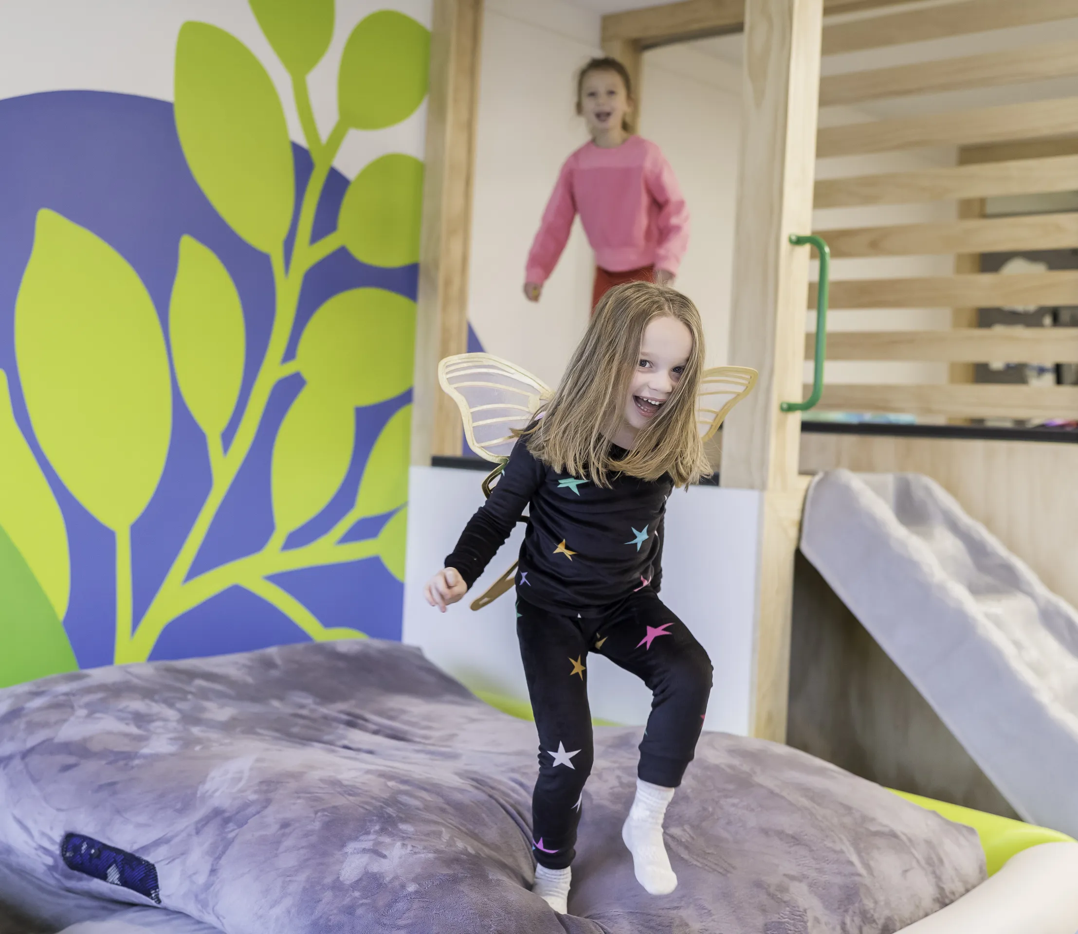 Girls playing on indoor playground