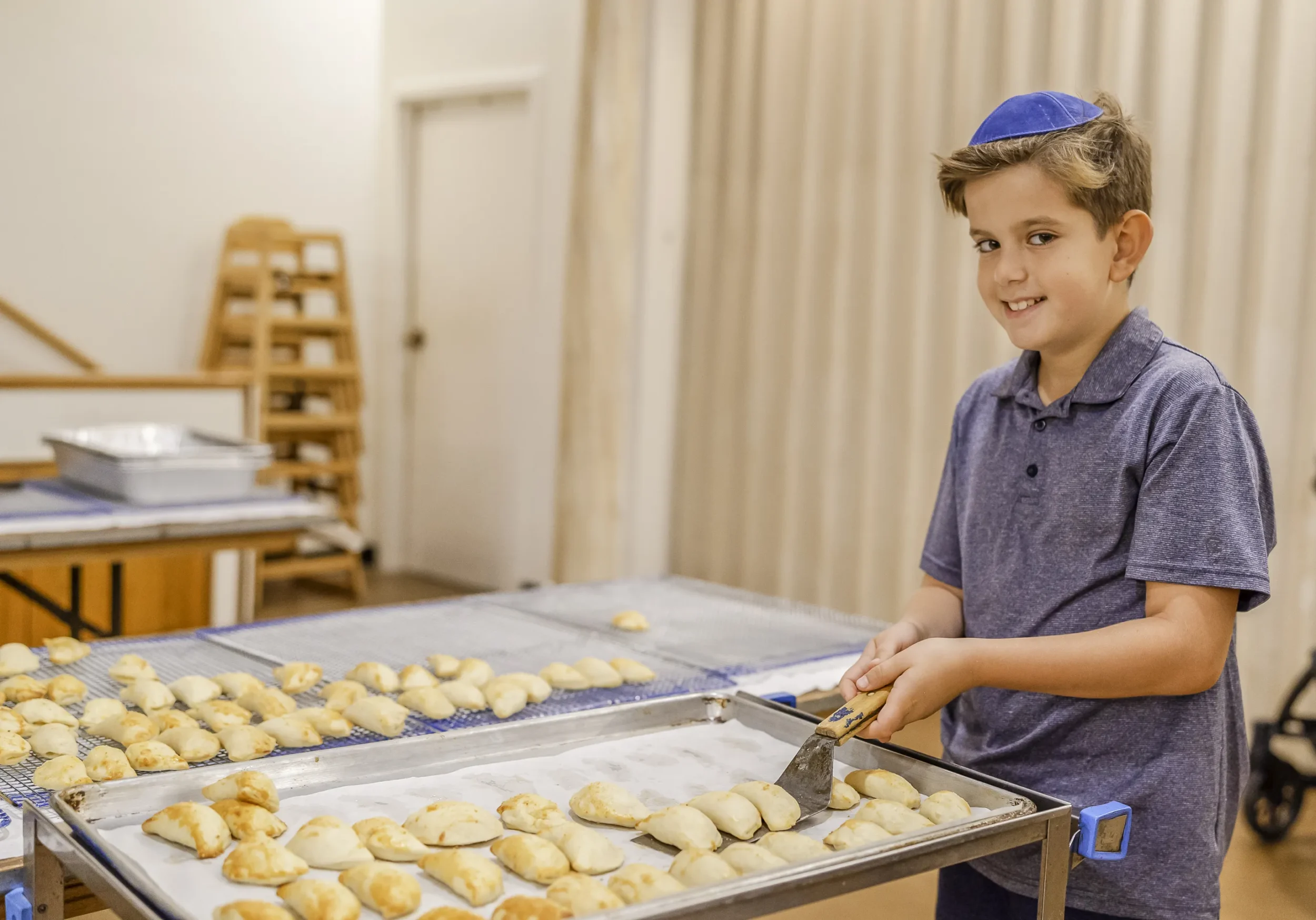 Jewish boy making bureka
