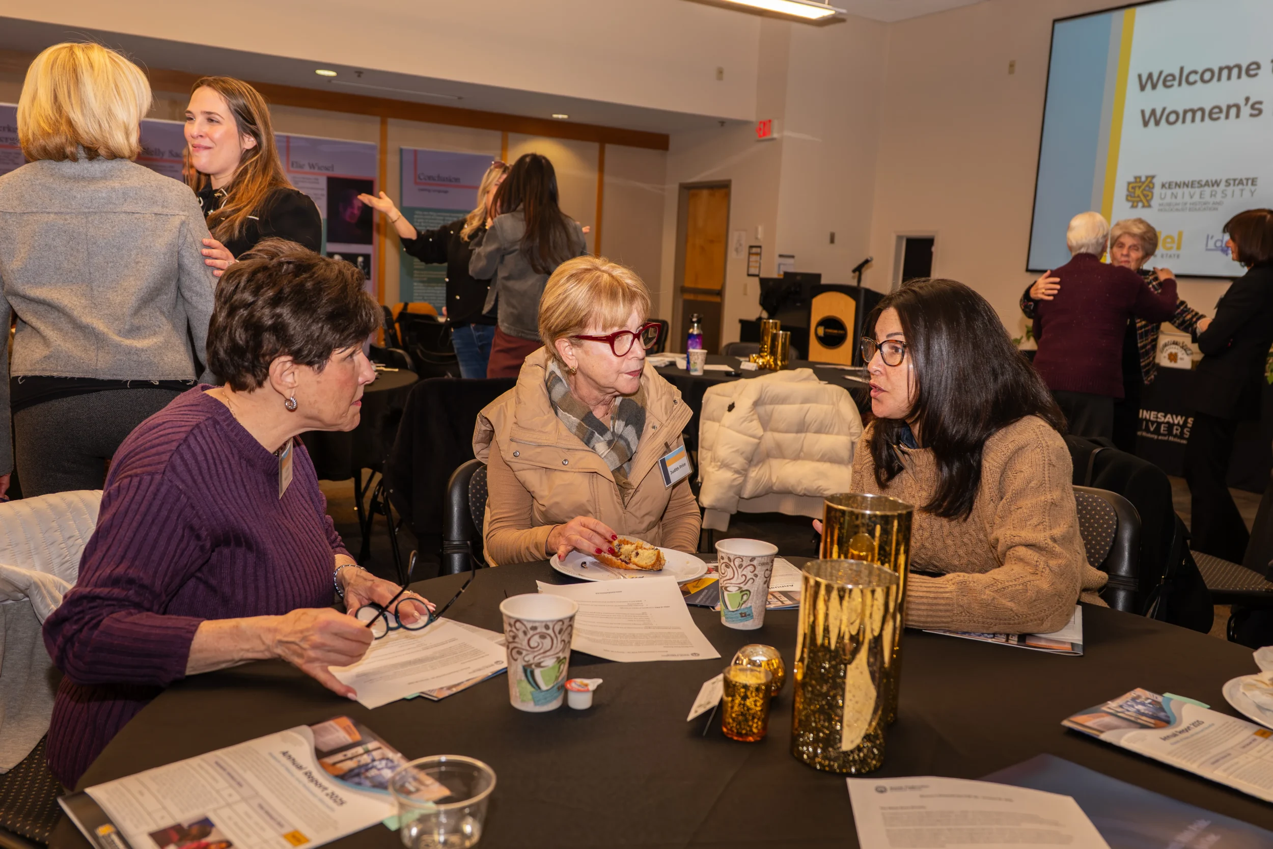 Women’s Philanthropy POP Up on Wheels A group of women speak with each other