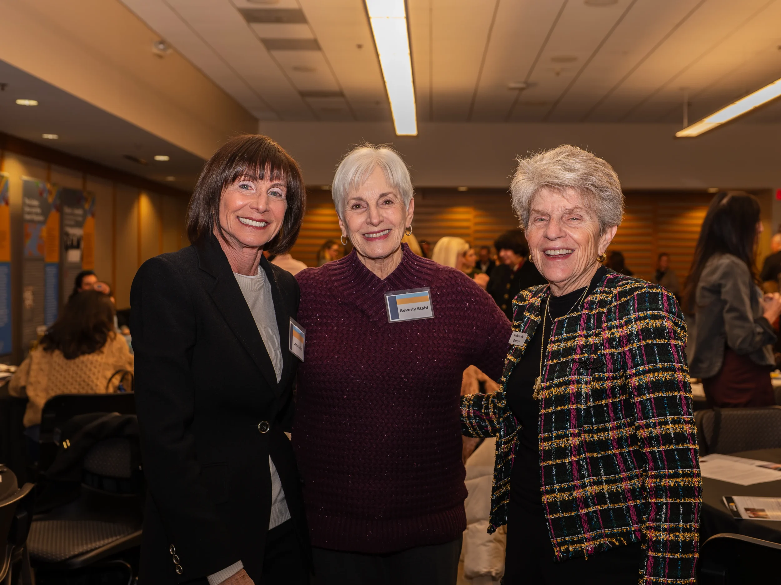 Women’s Philanthropy POP Up on Wheels a group of three women pose for the camera