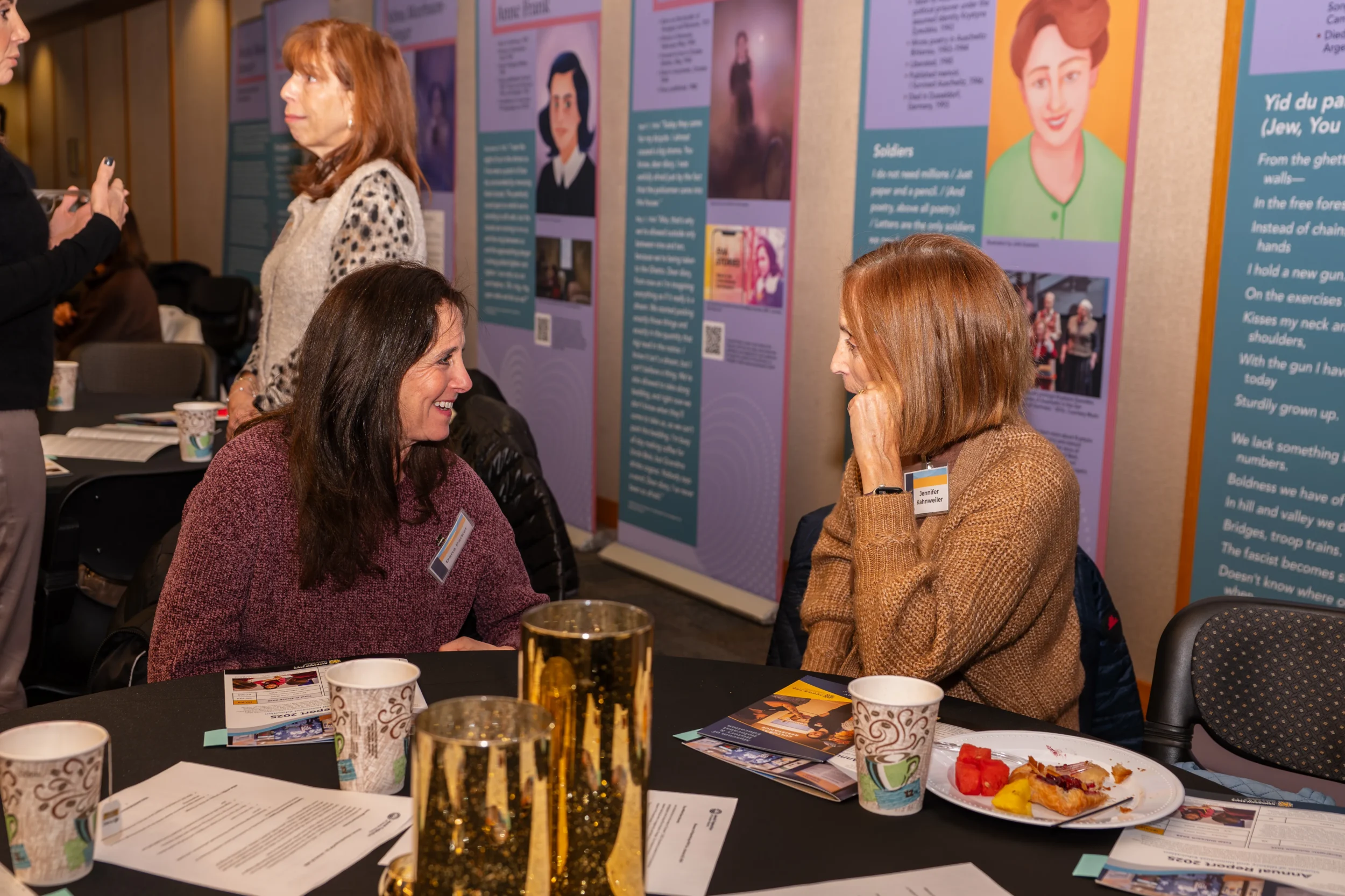 Women’s Philanthropy POP Up on Wheels Two women speaking