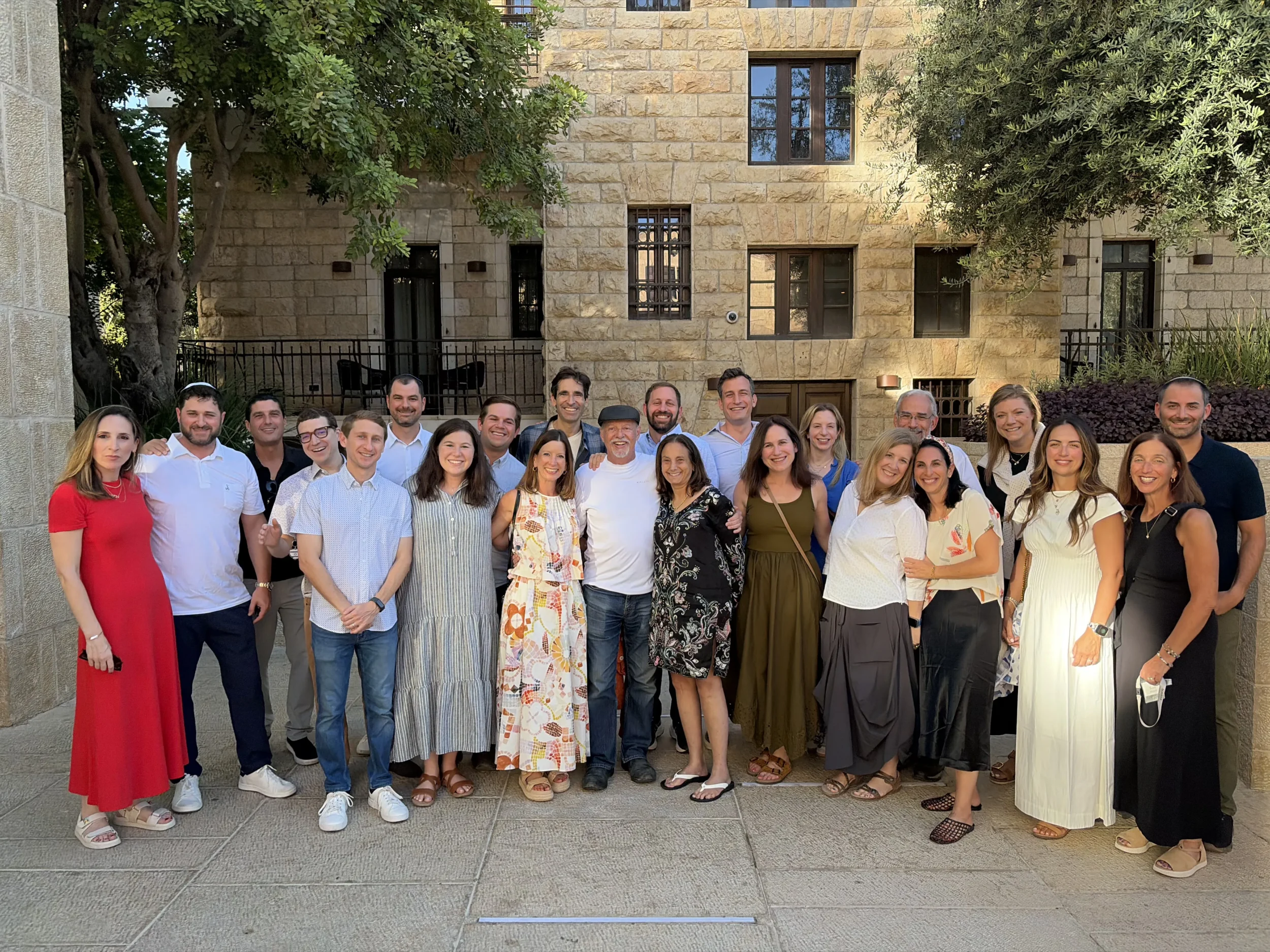 Tritt Fellowship participants pose together outdoors during a group gathering in Israel.