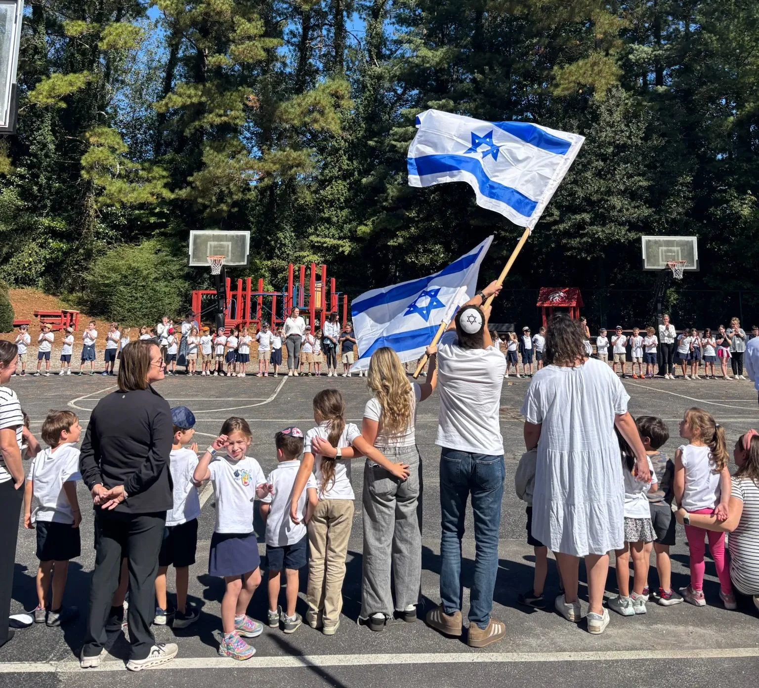 Two 2025-2026 Shinshinim at school rally