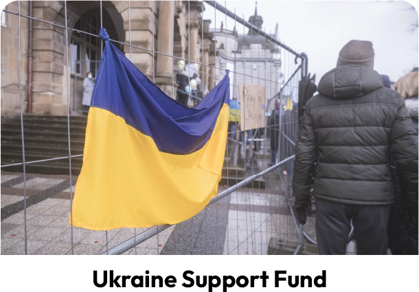 ukraine flag hanging on a fence